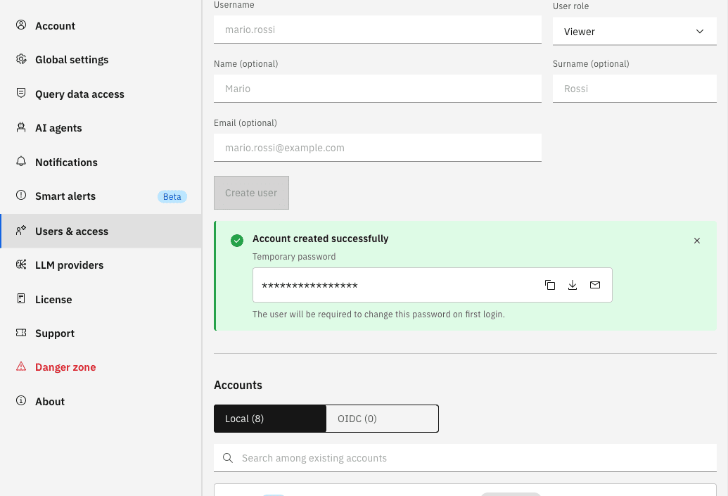 Account created successfully message with a masked temporary password and the copy