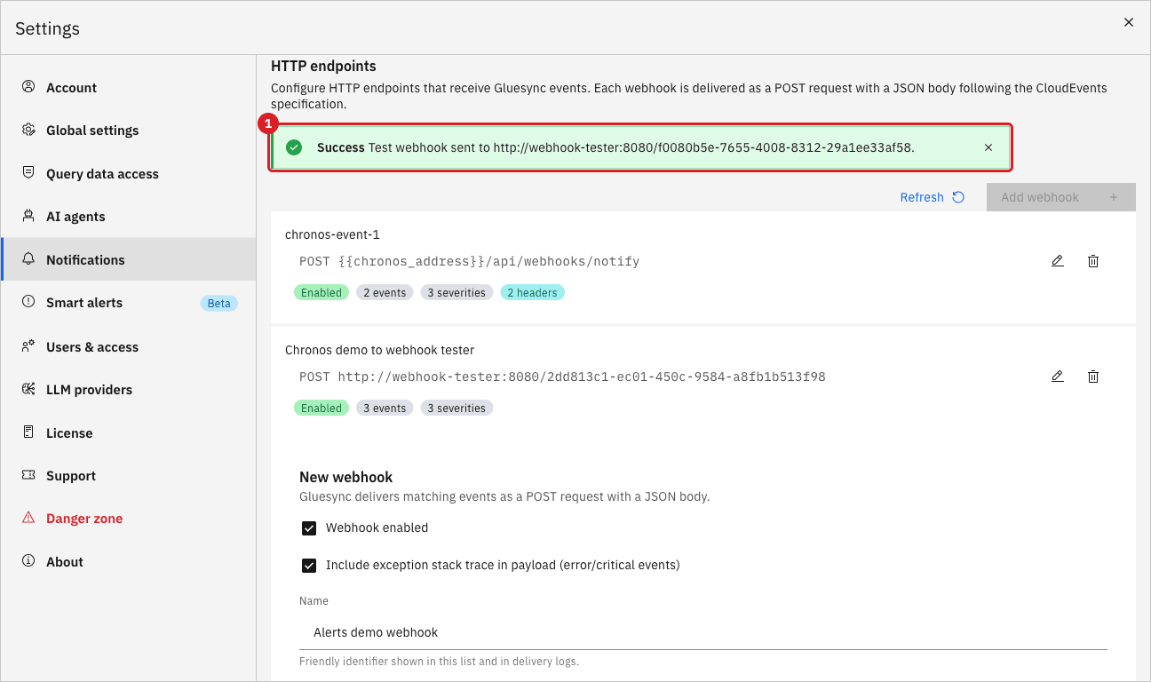 The top of the Webhooks tab with the Success message Test webhook sent to the endpoint URL marked by annotation 1