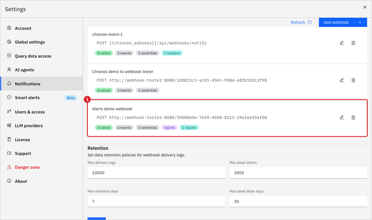 The list of webhooks with the new Alerts demo webhook card marked by annotation 1